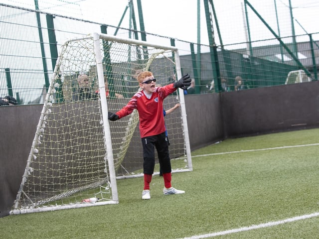 Action from one of the group games between Oxford United and Phoenix Athletic. The Phoenix keeper lines up his wall for a free kick.