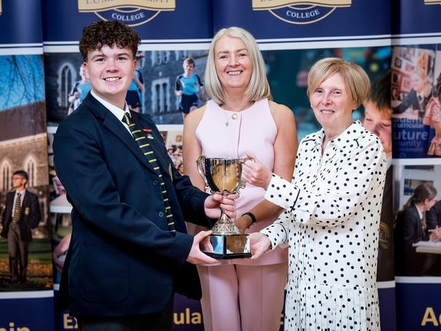 14. Meghan Harper (absent from photograph) and Cormac McCaffrey receiving the Year 10 Pupil of the Year Award from Dr Marie Ferris (Principal) and Mrs Ailish O’Kane (Head of Year 10). Stephen Latimer.