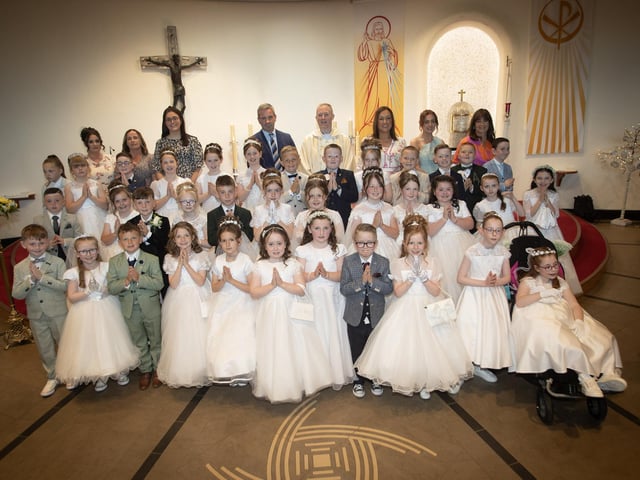 Pupils from Greenhaw Primary School who received the Sacrament of First Holy Communion from Fr. Sean O'Donnell at St. Brigid's Church, Carnhill on Friday last. (Photo: Jim McCafferty Photography)