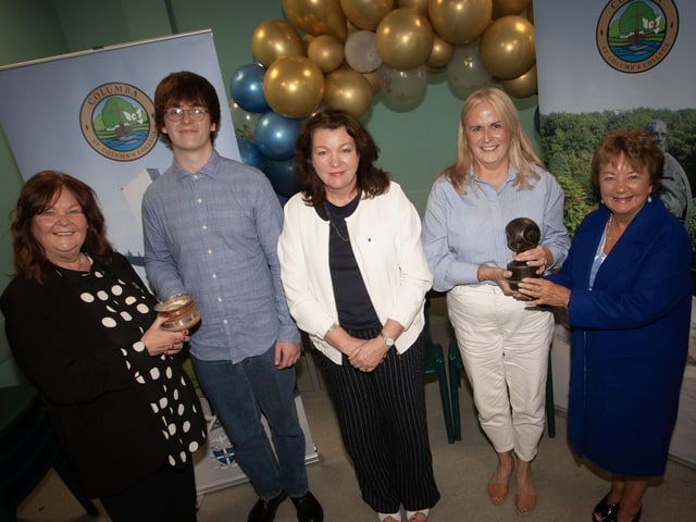 Ms. G. Canavan, board of governors, St. Columb's College presenting The Trinidad Valencera Prize for Spanish to Eoghan Carlin (on left). Centre is Mrs J Smyth, Head of Spanish, and on right, Rory Boyd's mum accepting the Doctor McDowell Prize for French on behalf of Conor McLaughlin from Ms. Marguerite Hamilton, Board of Governors.