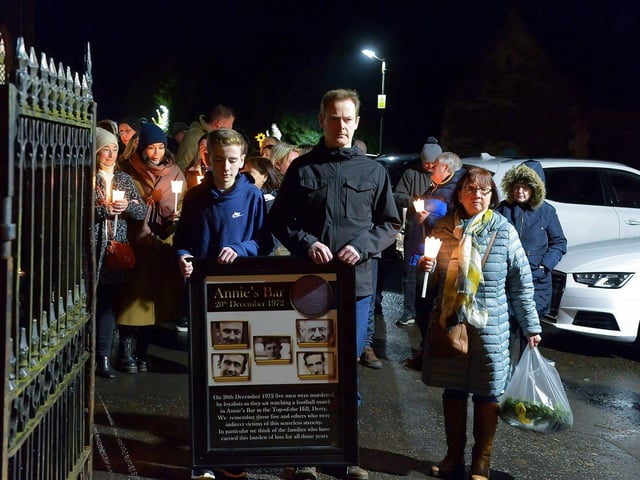 Relatives gather after mass at St Columba’s Church to take part in a wreath laying event, at Strabane Old Road, on the 50th Anniversary of the Annie’s Bar massacre on Tuesday evening. Photo: George Sweeney. DER2251GS – 12