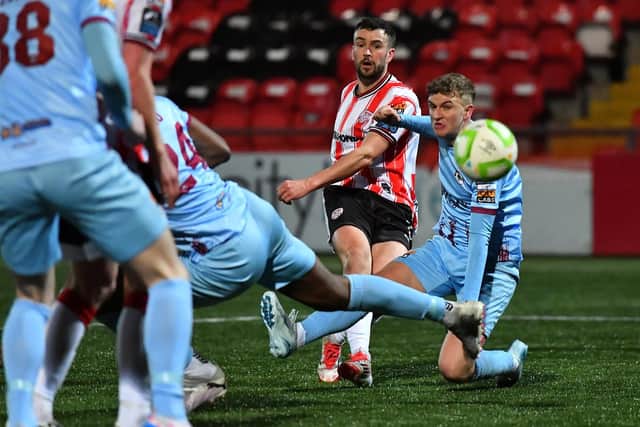 Derry City’s Michael Duffy scores the first of his two goals against Institute. Photograph: George Sweeney