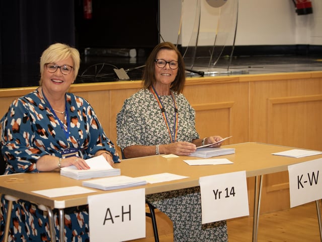 8AM AND READY TO GO!. . . .St. Mary's College staff Lynn Hasson and Tracy McAlister all ready to go with handing out A Level results in the school on Thursday morning. (Photos: Jim McCafferty Photography)