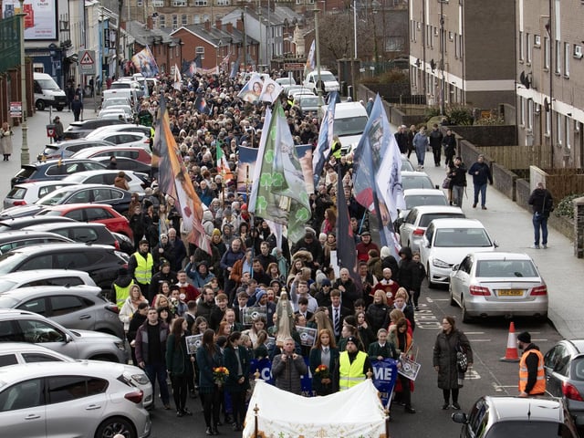 The Eucharistic Procession of the Faithful in honour of St. Brigid makes its way up Bishop Street and through the Gate on Saturday. (Photos: Jim McCafferty Photography)