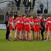Derry manager Rory Gallagher speaks with players before their game against Meath at Owenbeg. Photo: George Sweeney. DER2308GS – 51