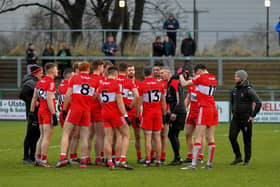 Derry manager Rory Gallagher speaks with players before their game against Meath at Owenbeg. Photo: George Sweeney. DER2308GS – 51