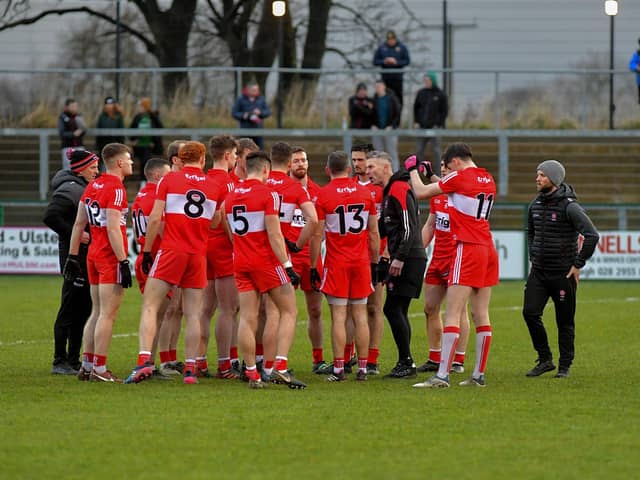 Derry manager Rory Gallagher speaks with players before their game against Meath at Owenbeg. Photo: George Sweeney. DER2308GS – 51