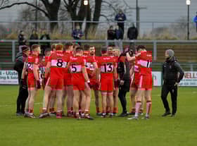 Derry manager Rory Gallagher speaks with players before their game against Meath at Owenbeg. Photo: George Sweeney. DER2308GS – 51