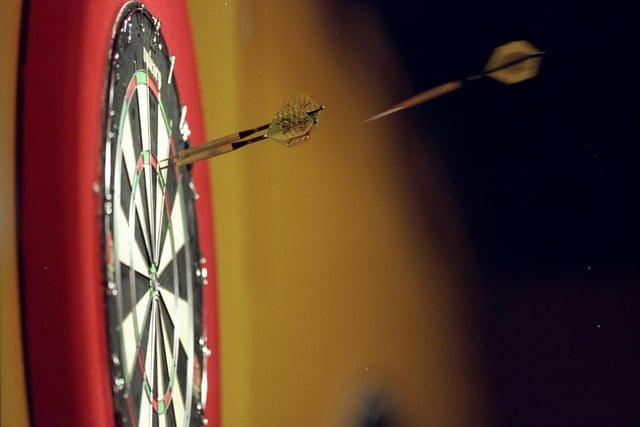 The humble dartboard and darts set was a must have for many a young person. (John Gichigi /Allsport)