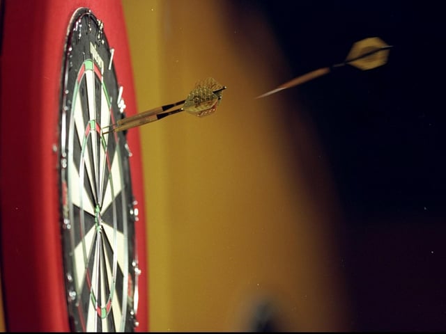 The humble dartboard and darts set was a must have for many a young person. (John Gichigi /Allsport)