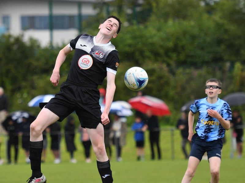 Steven Coyle wins this high ball for Maiden City Academy during their O'Neills Foyle Cup Under-13's final against Magherafelt Sky Blues.