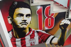 The Mark Farren mural in the tunnel of the stand named in the late striker's memory.
