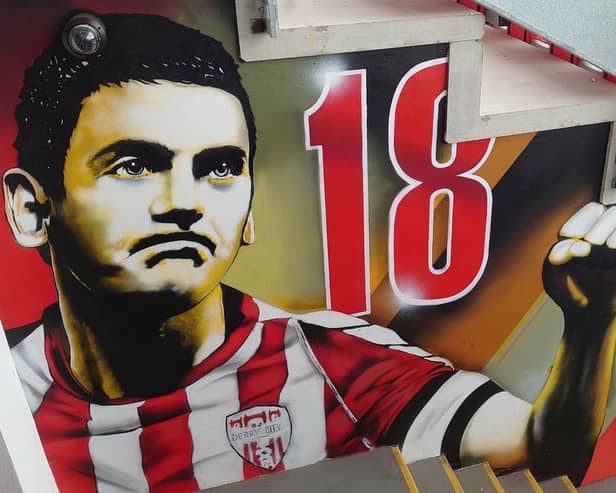 The Mark Farren mural in the tunnel of the stand named in the late striker's memory.