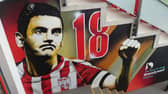 The Mark Farren mural in the tunnel of the stand named in the late striker's memory.