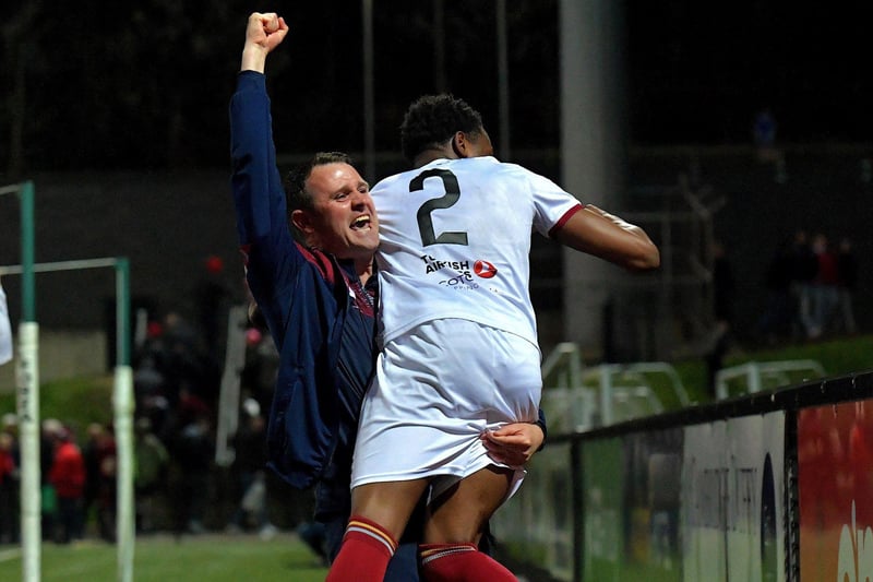 April 2023: Assistant manager Daire Doyle and goal scorer Elicha Ahul celebrate Drogheda United’s shock win over Derry City in the Brandywell.  Photo: George Sweeney.