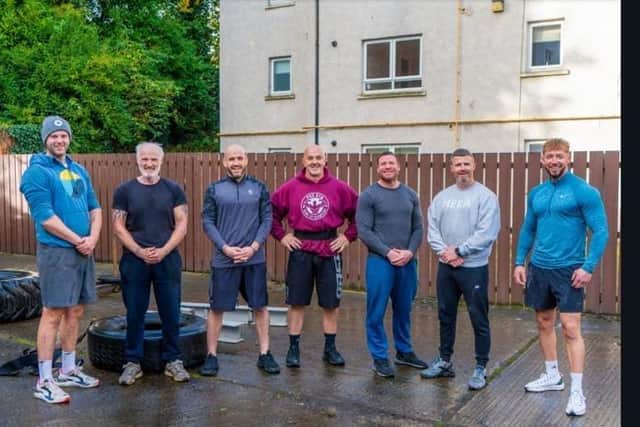 Dave Fox (centre) with some of the regular Strongmen who took part in the 30 day challenge at Pro Gym