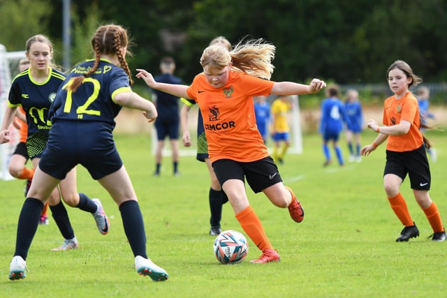 Mid Ulster Ladies player Nicola Keane on the ball during their Girls Under-11 match against Sion Swifts Colts at Wilton Park.