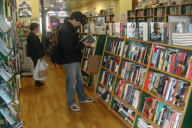 Browsing the shelves of Bookworm in 2004.