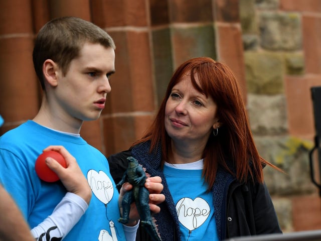 Alma White and her son Caleb at the Caleb's Cause rally calling for legal protection for young people with Special Educational Needs who have disabilities in Northern Ireland beyond the age of 19. Photo: George Sweeney