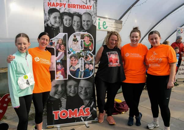 Geraldine Mullen, third from right, pictured with Lily Fitzgerald, Martina Cawley, Kaitlyn Fitzgerald and Siobhan Kilbride ahead of the Tomás memorial 5k fun walk / run held in Moville on Sunday morning.  Photo: George Sweeney