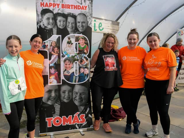 Geraldine Mullen, third from right, pictured with Lily Fitzgerald, Martina Cawley, Kaitlyn Fitzgerald and Siobhan Kilbride ahead of the Tomás memorial 5k fun walk / run held in Moville on Sunday morning.  Photo: George Sweeney