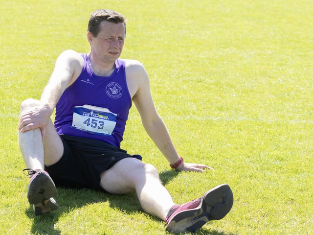 Cormac Lynch of Foyle Valley stretches ahead of the Strabane Lifford Half Marathon