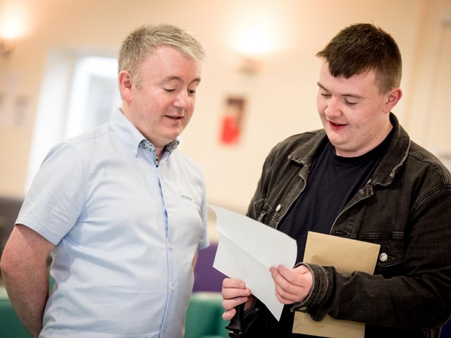Dr Gormley (Senior Teacher – Head of Sixth Form) and John James Nelis.