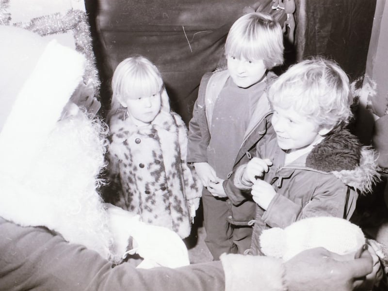 Children meeting Santa Claus at Wellworths shop in Waterloo Place.