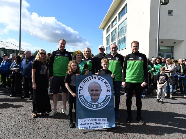 Bernie McGuinness and family members led the Chieftain’s Walk from Bay Road to Foyle Road. Photo: George Sweeney