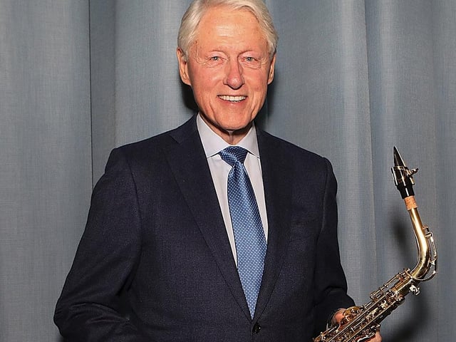 Bill Clinton pictured with a saxophone. The former US President is a keen player.