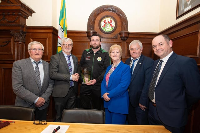 Donegal County Council honoured Cockhill Celtic F.C. on Friday with a civic reception at the County House and presenting the commemorative trophy are Tommy Doherty, Club Chairperson, John McLaughlin, Chief Executive Donegal County Council, Gavin Cullen, team manager, Cllr. Rena Donaghey, Cllr. Martin Harley, Cathaoirelach Donegal County  Council and Patsy Lafferty, Director of Housing, Corporate & Cultural Services. Photo Clive Wasson
