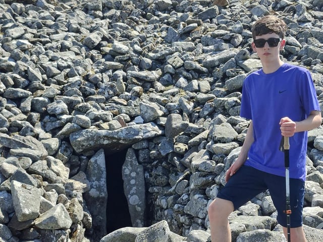 Shae Maguire at a passage tomb discovered during his #LeapLeinster challenge.