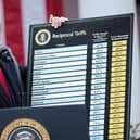 WASHINGTON, DC - APRIL 02: U.S. President Donald Trump holds up a chart while speaking during a “Make America Wealthy Again” trade announcement event in the Rose Garden at the White House on April 2, 2025 in Washington, DC. Touting the event as “Liberation Day”, Trump is expected to announce additional tariffs targeting goods imported to the U.S. (Photo by Chip Somodevilla/Getty Images)