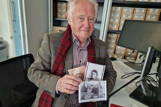 Robert Hutchinson junior with photographs of his grandparents Jacob and Sara Hutchinson and The Cottage, Rosemount, where they lived in the early 1900s.