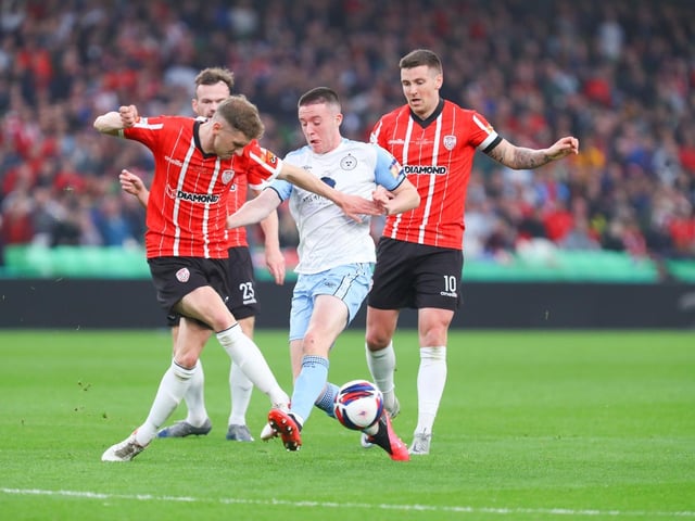 Derry City defender Ronan Boyce nip in ahead of Shelbourne's Jack Moylan during the Candystripes' 4-0 FAI Cup final victory in the Aviva Stadium on Sunday. (Photo: Photo: Kevin Moore/MCI)