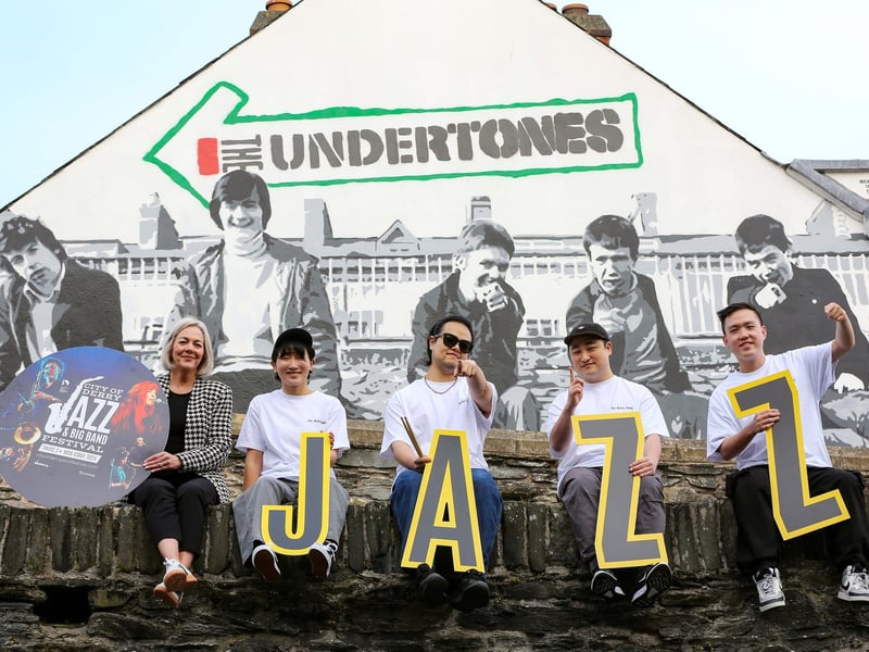 Council Jazz Festival Coordinator Andrea Campbell with South Korean Jazz band Odd Meter Fairy and the JazzysCredit © Lorcan Doherty
