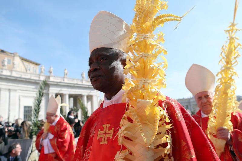 Cardinal Peter Kodwo Appiah Turkson was born on 11 October 1948 in Nsuta-Wassaw, Ghana. He attended St. Teresa’s Seminary from 1962-1969 in Amisano and St. Peter’s Regional Seminary in Pedu from 1969-1971. On 20 July 1975 he was ordained for the Archdiocese of Cape Coast. On September 24, 2013, he was confirmed by Pope Francis as President of the Pontifical Council for Justice and Peace. He has been awarded numerous honorary degrees and speaks 6 languages (Fante, English, French, Italian, German, Hebrew). (Photo by Franco Origlia/Getty Images)
