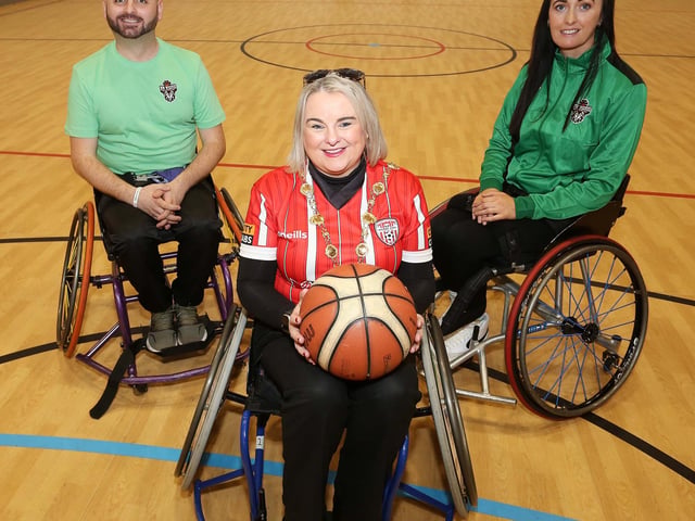 The Mayor of Derry, Councillor Sandra Duffy with Paul Coyle, treasurer, and Sam Barr, coach, at the NW Wolves Wheelchair Basketball Club Community Launch Day at Shantallow Community Centre.