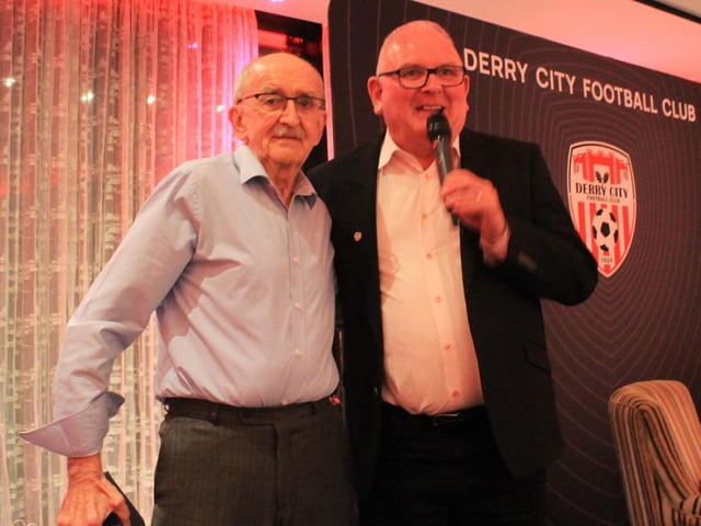 Former Derry City director and volunteer Martin McDaid receives his special recognition award from Derry City CEO Sean Barrett.