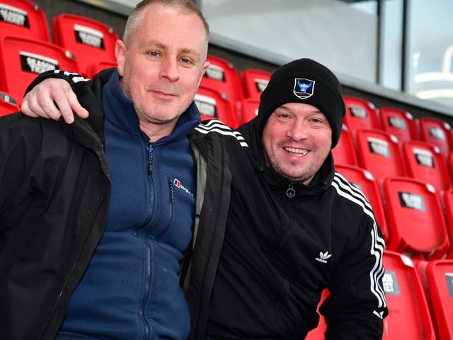 You only smile when you're winning . . . These two City fans are enjoying that winning feeling at Brandywell.