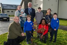 Mason Duddy pictured with his brothers, Caiden, 12, Blake, 5 months and Logan, 8 and his mum Michaela with the tree which was planted at his school, Our lady of Fatima PS, Tamnaherin as part of the Life Tree Project which sees an Oak tree planted for every Birth, Death and Marriage recorded in the Derry City and Strabane District Council Area. Mason planted an Oak sapling for his brother Blake with the help of the Mayor, Councillor Lilian Seenoi-Barr, Councillor Declan Norris, Principal Jack Logue and Mrs Mairead Conway, class teacherr. Picture Martin McKeown. 25.11.24