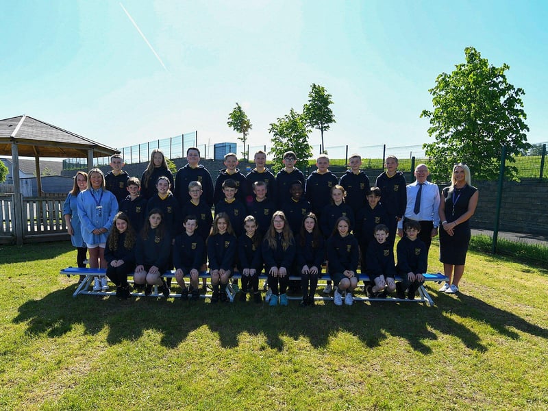 Mr Hamilton and support staff pictured with P7A class at Ebrington Primary School.