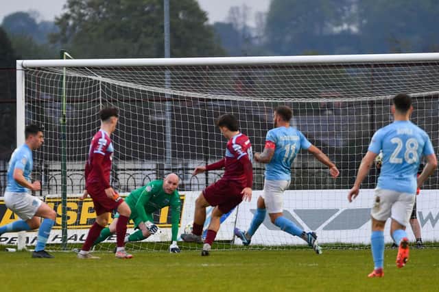 Sean Carlin's left footed strike is saved by Ballymena keeper Sean O'Neill in the first half at the Showgrounds. Photo - Andrew McCarroll/ Pacemaker Press