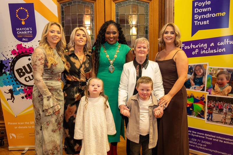 The Mayor Councillor Lilian Seenoi-Barr hosted a concert in the Guildhall in memory of the late Paddy Tyre in aid of her chosen Mayoral Charity BUD Club and Foyle Down Syndrome Trust. Pictured with the Mayor are Paddy's wife Evelyn, Kirtsy Hamill, grand daughter and daughters, Rosin Hamill and Aoife McCourt with Paddy's grand children Zara Hamill and Tiernan McCourt. Picture Martin McKeown. 05.12.24