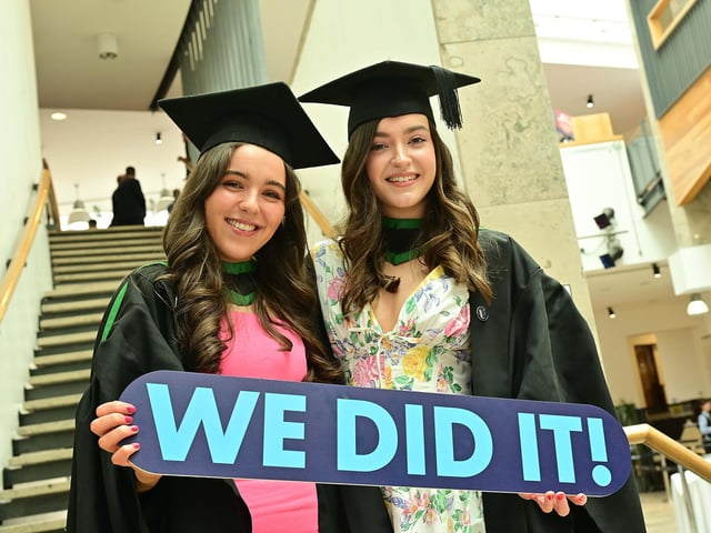 We did it! Emer O’Brien from Belfast and Celine McLean from Donegal celebrating  as they graduate with BSc (Hons) Occupational Therapy from Ulster University Derry.