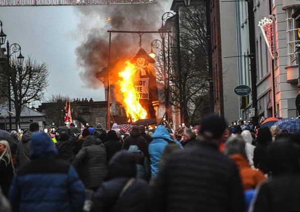 A large effigy of Colonel Robert Lundy was alight on Saturday as part of the Apprentice Boys of Derry’s annual ‘Shutting of the Gates’ celebrations in Derry city centre. Photo: George Sweeney