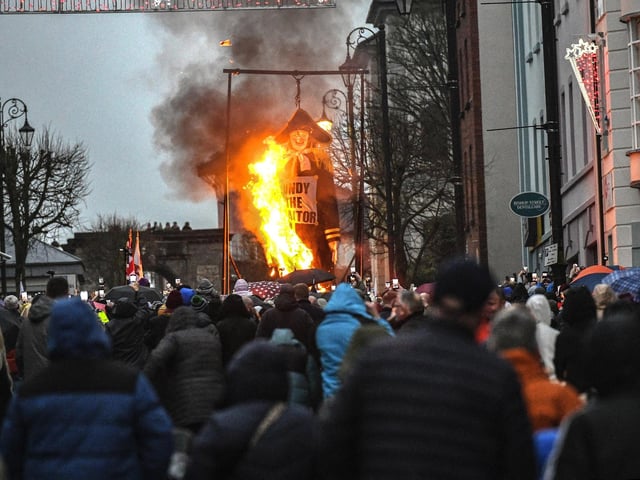 A large effigy of Colonel Robert Lundy was alight on Saturday as part of the Apprentice Boys of Derry’s annual ‘Shutting of the Gates’ celebrations in Derry city centre. Photo: George Sweeney