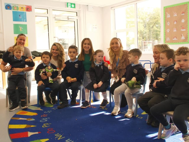 Ardnashee Primary School class with L-R - Bríd Rea (Teacher), Class Assistants Aisling Duffy, Ellie Brod and Colleen Ferns and Bríd Cutliffe (Head of EYFS).