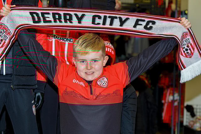 Super fan Ronan McDaid records a good luck video message for the Derry City team, at O’Neill’s Sports store, ahead of their Extra.ie FAI Cup final against Shelbourne. DER2244GS – 05