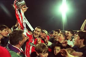 Sean Hargan with the league Trophy at Brandywell in 1997.